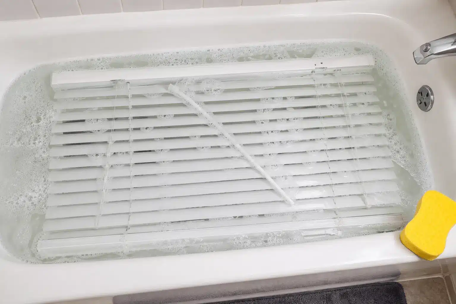 Cleaning blinds in bath tub