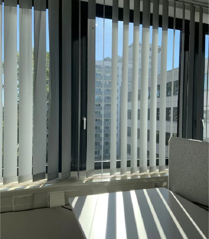 Vertical blinds on Miami high-rise office windows