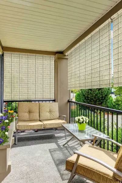 Woven balcony blinds providing shade and style