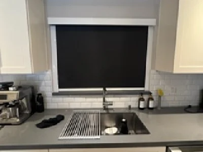 Custom blackout window shade in modern Miami kitchen
