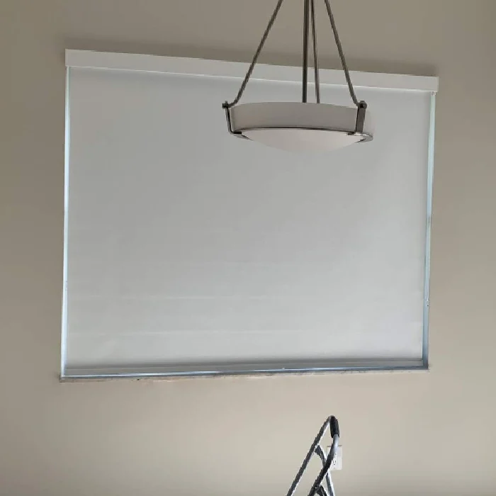 Simple white roller shade